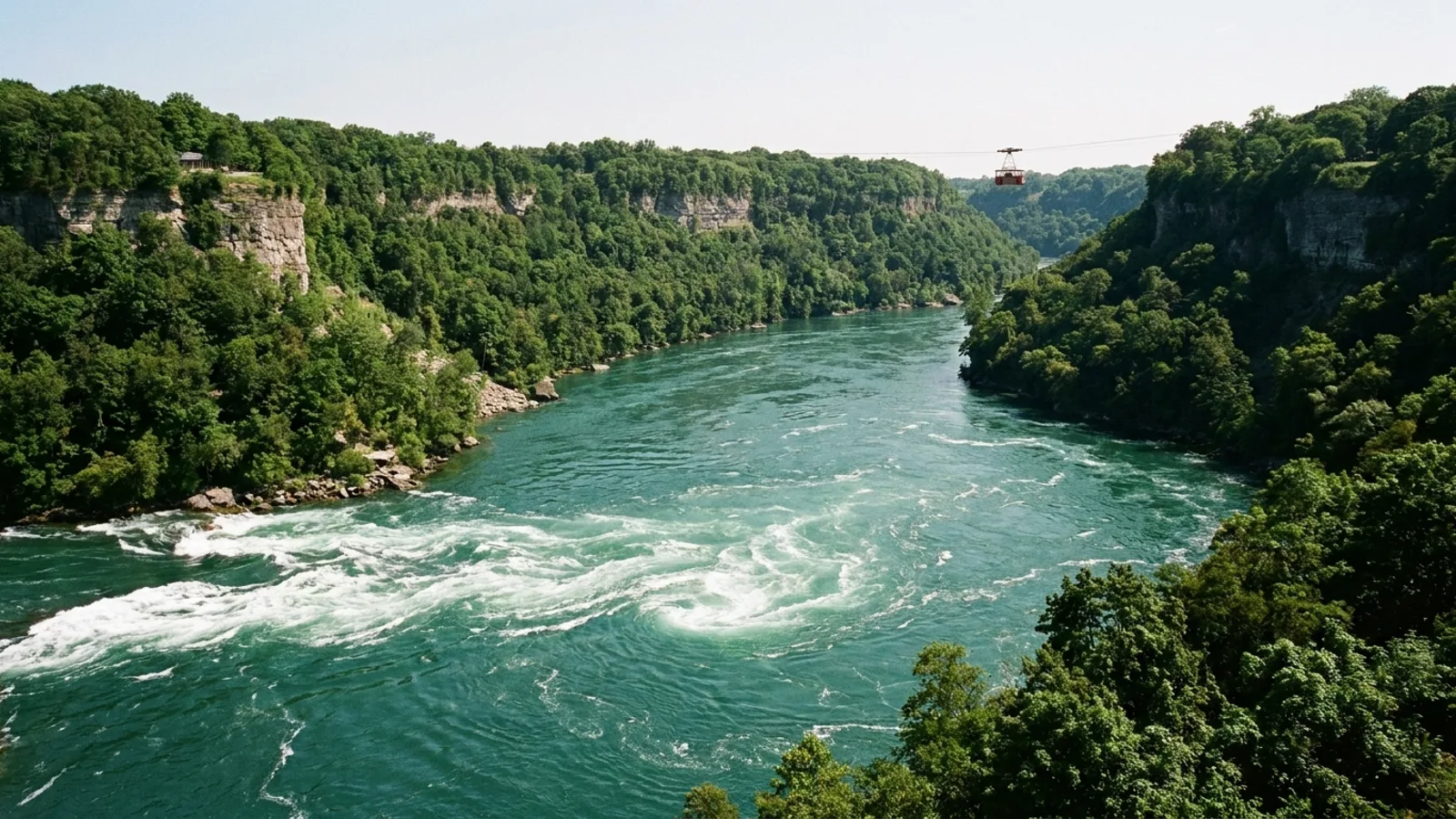 The Niagara Whirlpool from the Canadian rim, with the aerial cable car crossing high above the basin